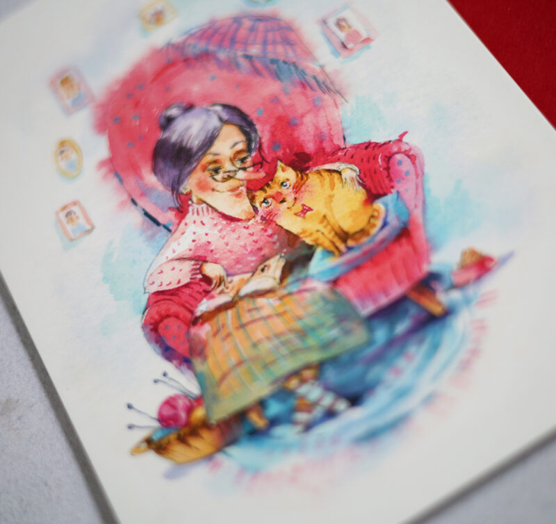 Grandma and Cat Cozy Reading Postcard – A Charming Watercolor Illustration